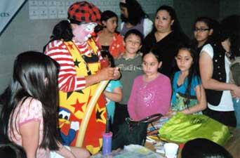 Clowns, food and fun at end of year party for tutors and students