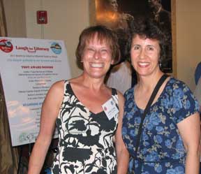 Kathy Lyons, new board chairwoman, conratulates Irma Maciel for her award