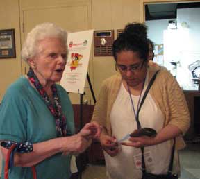 Rosa Barbosa checks her raffle ticket