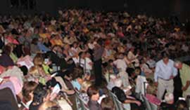 guests fill theater
